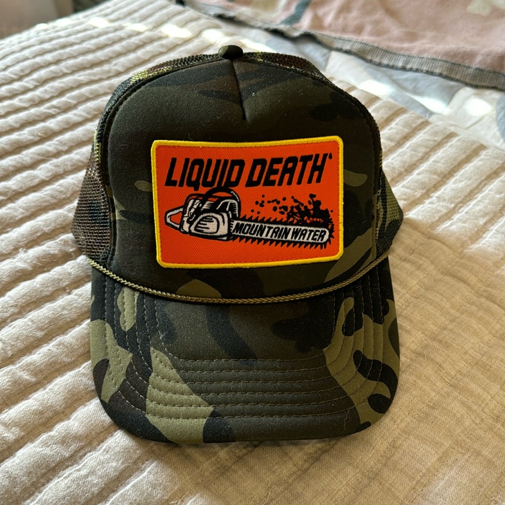 NWOT Liquid Death Camo Chainsaw Trucker Hat